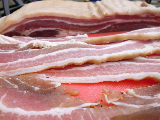 Cutting bacon into rashers